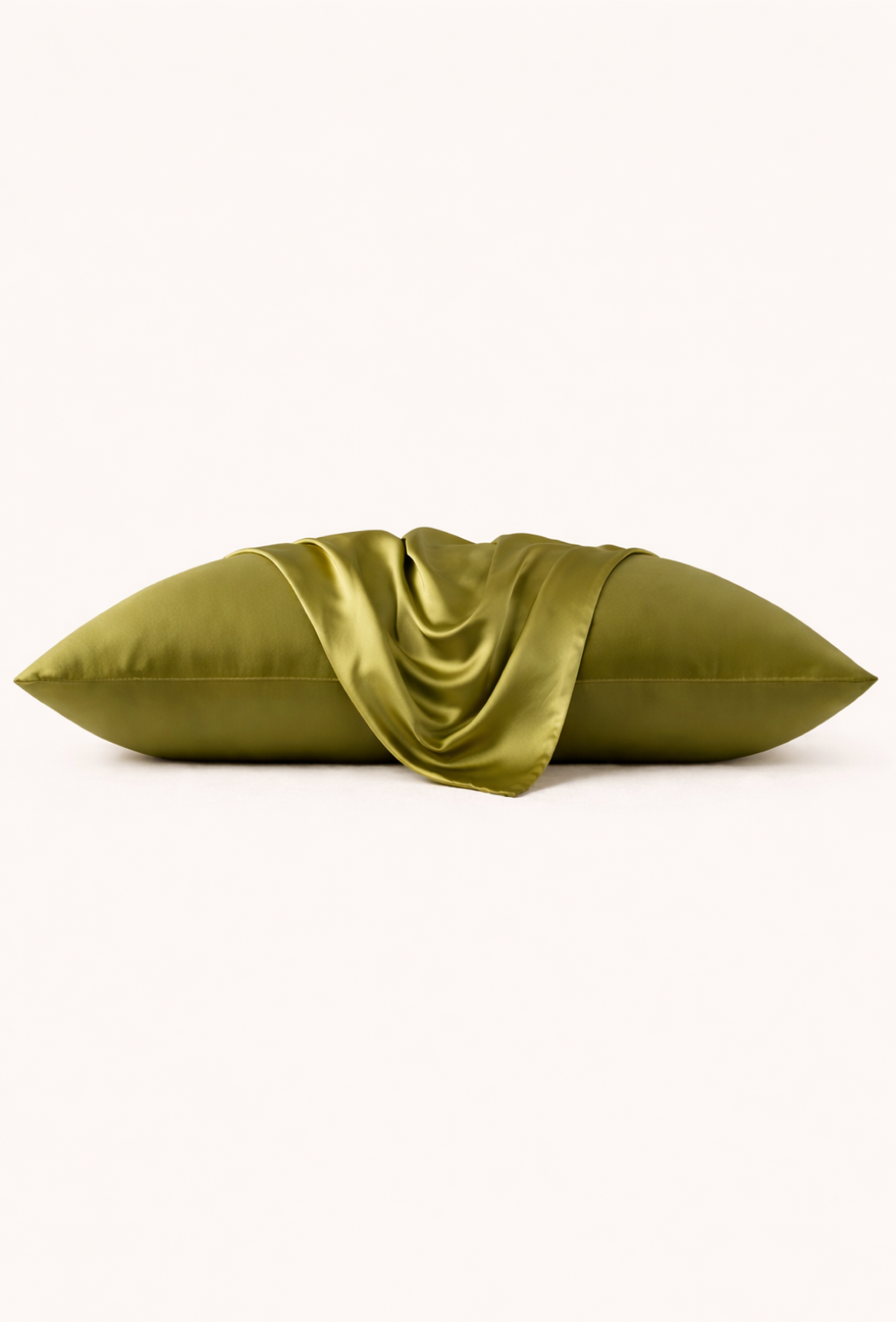Olive silk pillow on a white background