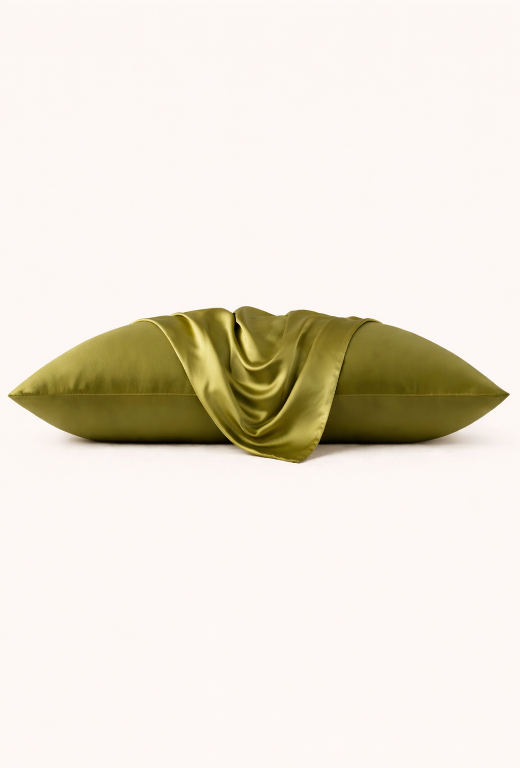 Olive silk pillow on a white background